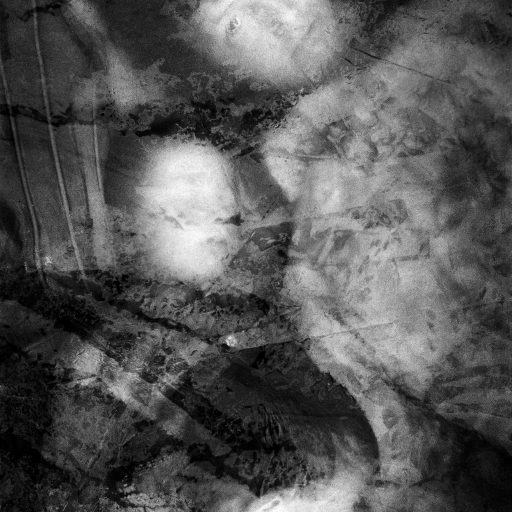 Kosovar Albanians sleep in a plastic tent in one of the refugee tractor camps in Kukes, Albania, near the border with Kosovo, April 8, 1999.  After the 1997 collapse of Albania's economy, widespread looting and ethnic conflict broke out in Albania and Kosovo, a majority Albanian province in southern Serbia, which led to the mass exodus of thousands of ethnic Albanians in 1998 and early 1999; nearly all of these 850,000 refugees returned to Kosovo starting in mid-1999, many seeking revenge against the Serbs.  

Photo by: Joachim Ladefoged / VII
