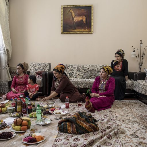 On 29 March 2018 in Turkmenistan, Eziz, 28 (father) and Nazik, 23 (mother) at home during a celebration for their second child, Abdylguly, a baby boy born 26 March. 

Eziz arrives at the hospital with his close and extended family. He’s dressed in the obligatory dark suit and white shirt. His hair is slicked back as he drives into the hospital car park in a car covered in decorations, toys, banners and balloons. He rushes upstairs and waits as his baby is dressed in the white silk blankets. “I’m so proud to be a father for the second time. He’s my second son,” Eziz says proudly. “I haven’t slept for two weeks, I was so nervous. Now the baby has arrived we can celebrate and relax. This celebration is the father’s role. It creates memories that you can look back on in years to come.” 
Eziz is an entrepreneur and has his own textile company. “When I come back from work I’m always anxious to see my first baby. I rush into the home and my world shines again,” he said. “It’s stupid not to pay attention to children. Those fathers who are not involved didn’t get attention from their fathers, it’s a dangerous cycle. To rear a child with love and pay attention to their needs makes them more engaged in the world around them. Love is the key to bringing up children. When there isn’t love, children are brought up senseless,” said Eziz.  © Adriana Zehbrauskas.